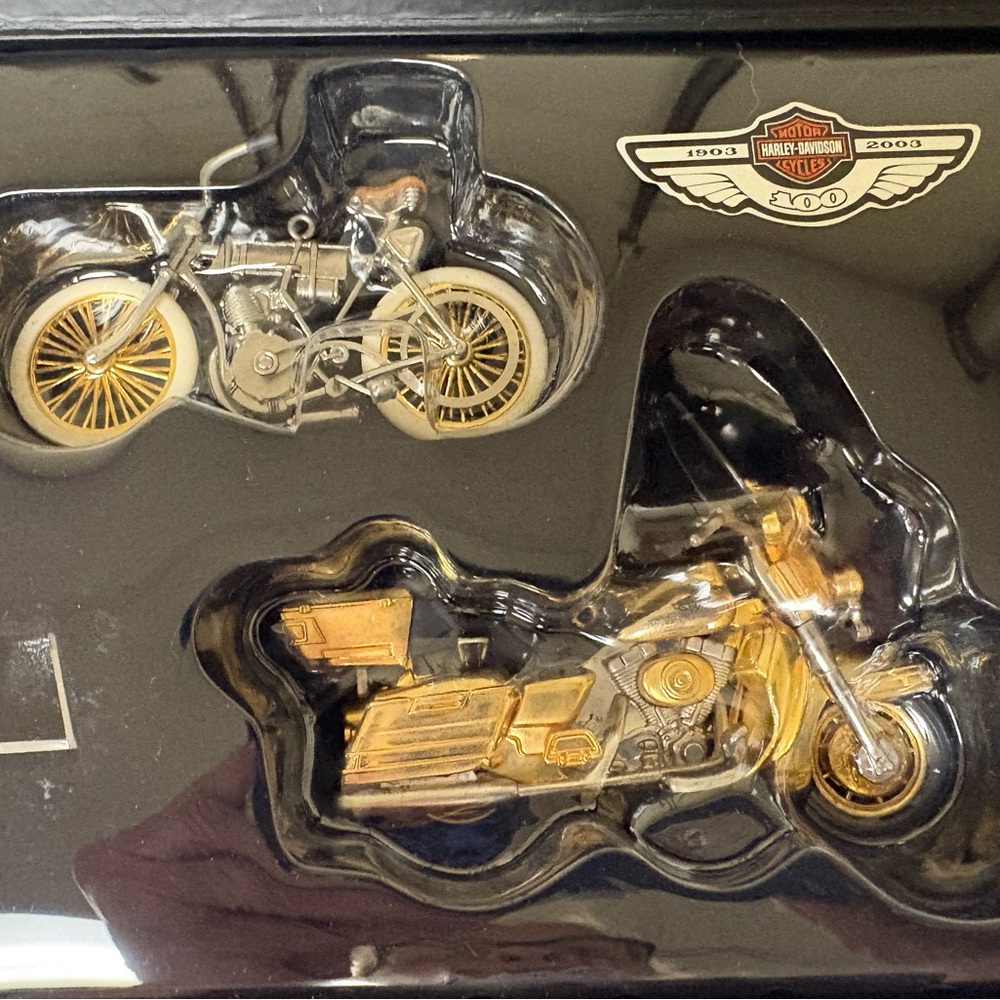 Harley-Davidson Gold and Silver Motorcycle Ornaments in a custom case.